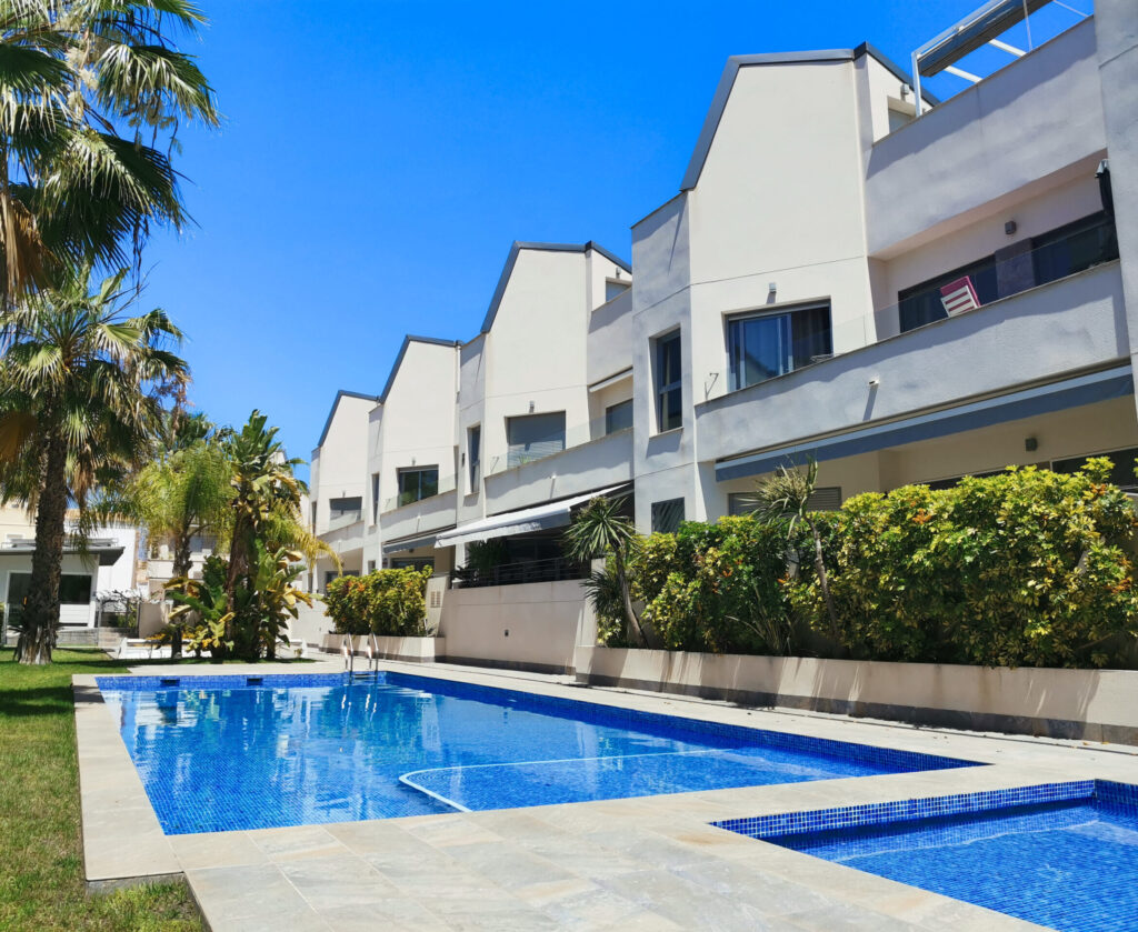 front view of the apartment and pool front view of the apartment and pool
